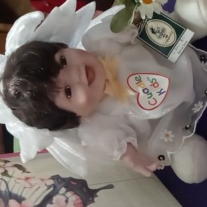 Geppeddo.....Cuddle Kids "Darcie Daisy"